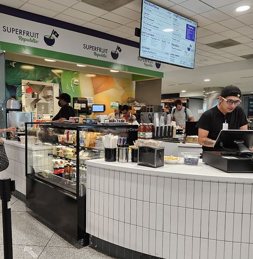 In the middle near gate 39 at Superfruit Republic  in Denver