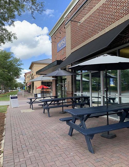 Outdoor patio-dog friendly   at Mpishi in Charleston