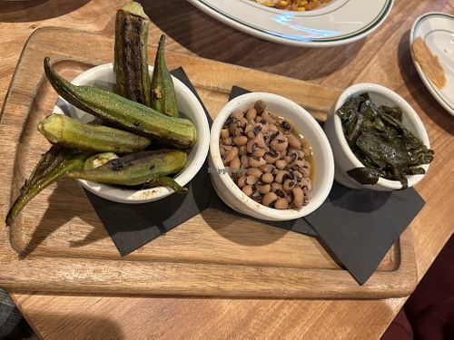 Vegan charred okra, black eyed peas, and collard greens.   at Fixins in Sacramento