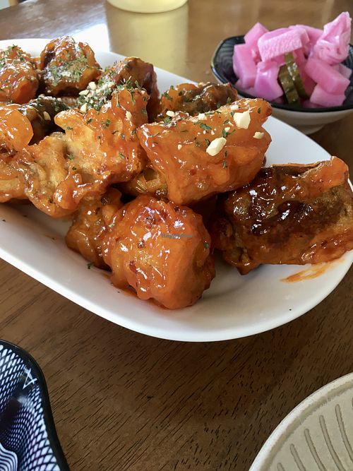 Fried mushrooms: perfectly crispy and not oily king oyster mushrooms coated in a savoury sauce that are still juicy on the inside  at Soombida - 숨비다 in Jeju