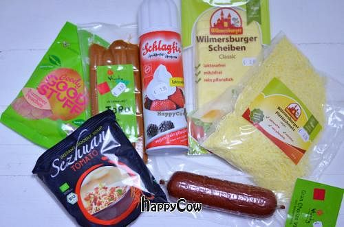 Noodles, sausages, grated cheese, sliced cheese, chorizo, whipped cream, gummies at Pasion Vegana in Zaragoza