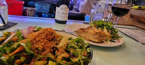 Salad and vegan scalloped potatoes dish at BiGA. in Prescott