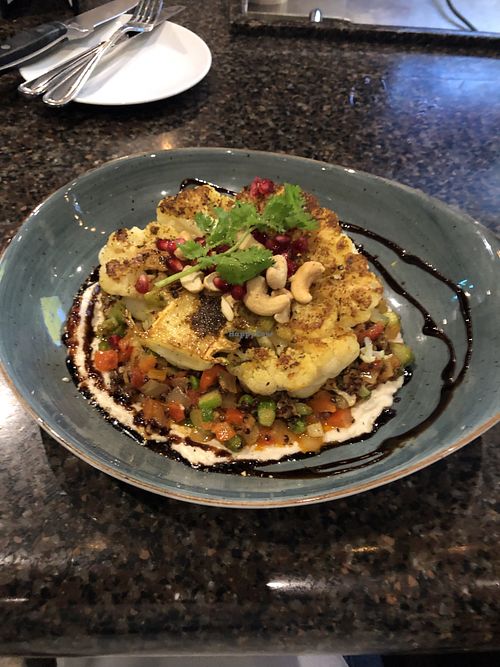 Spicy cauliflower steak. So delicious!  at REDS   in Niagara Falls