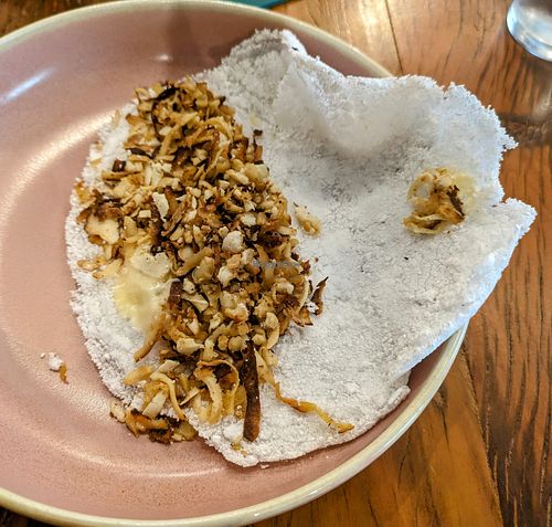 Smoked mushroom and fake mozarella tapioca, opened for the photo. Tapioca itself was decent enough, but the filling elevated it to make it the best tapioca I've ever had. at Teva Deli in Rio De Janeiro