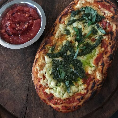 Appetizer: vegan “Focaccia Ricotta” at Meshek Barzilay in Tel Aviv