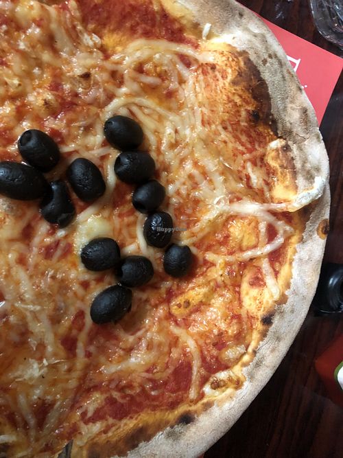 Margherita with vegan cheese and extra olives at Pizzeria Foculus in Ljubljana