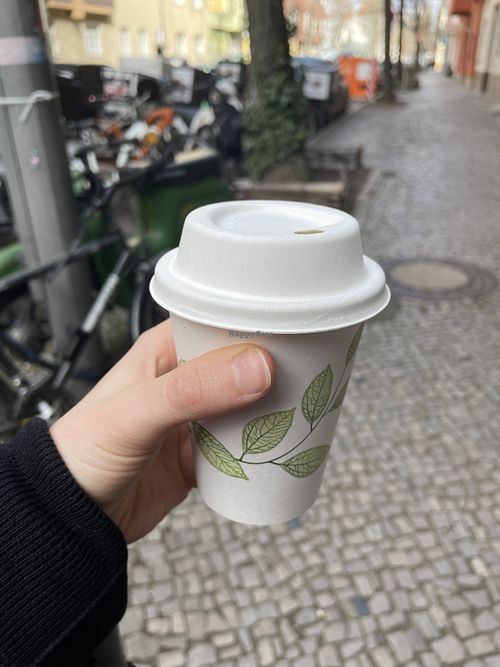 Tiny cup of ‚matcha‘ latte   at Pele-Mele in Berlin