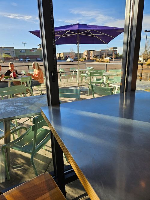Outdoor seating at MAD Greens in Lone Tree