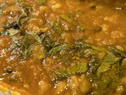 Yellow lentil cooked with turmeric, cumin & lots of garlic. - Manjal dal tadka  at Zamorins in Whitley Bay