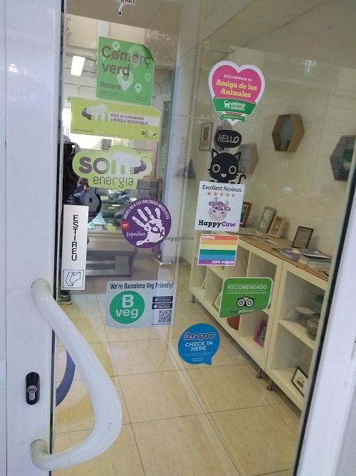 Stickers on their door at Vegetart Cuina Vegana in Barcelona