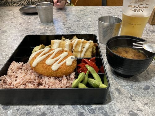 Terrible photo of the bento: there are veggies under that tofu, and a couple of gyoza  at Tokyo Maki - Melbourne in Melbourne