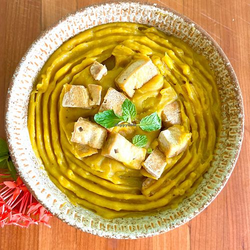 Pumpkin Mango Soup:
Sweet and spicy soup with mango, pumpkin and sweet potato. Served with sliced whole grain bread. at Mettā Guesthouse Kampot in Kampot