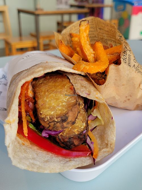 Tempeh wrap with sweet potato fries at Krowarzywa - Hoza in Warsaw