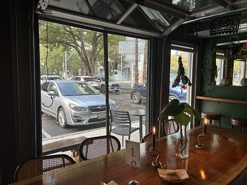 I dude with garage doors open   at Immortal Cafe & Supply in Sacramento