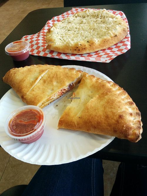 Pepperoni and cheese calzone with garlic cheezy breadsticks at Vegan Pizza in Garden Grove