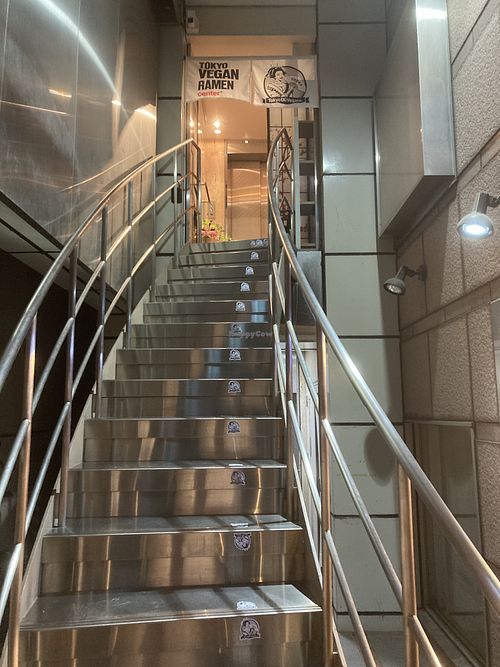 Go up here  at Tokyo Vegan Ramen Center in Tokyo