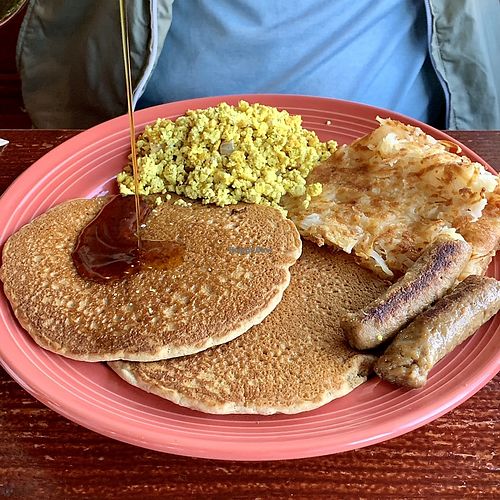 Pancakes, sausage, tofu scramble, hash browns  at The Grain Cafe in Los Angeles
