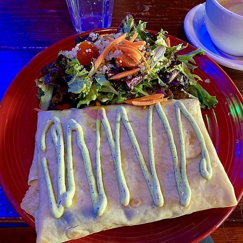 Breakfast crepe with salad on the side. Delicious.  at The Grain Cafe in Los Angeles