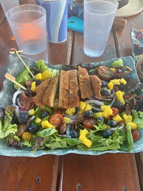 Blueberry Mango Greens with crispy “chicken"  at GT's On the Beach in Port Stanley