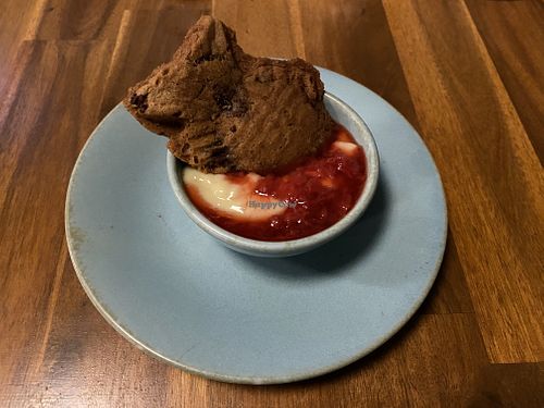 Taiyaki - fish-shaped waffle cake filled with anko swimming in housemade custard and seasonal fruit compote  at Muku Ramen Bar in Belconnen