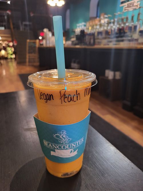 Vegan Peach Mango Smoothie! at The Beancounter Coffeehouse & Drinkery in Burlington