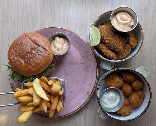 Vegan burger with chili mayo, avocado fried with chili mayo, and fried cauliflower with garlic aioli at Kaffi Krokur in Saudjarkrokur