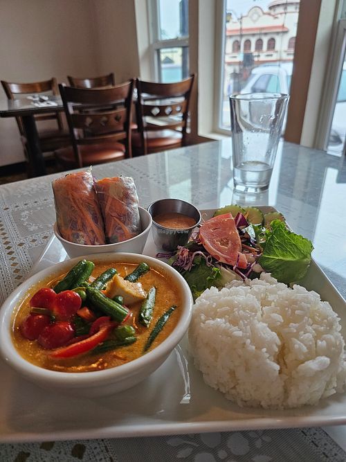 Lunch special with penang curry and fresh tofu spring rolls. (Came with dressing that is almost certainly not vegan) at Royal Thai in Auburn