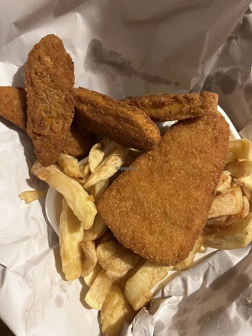 Fishless fish steak, chips and meatless chicken nuggets. Also had mushy peas!   at Family Fish Bar in Norwich