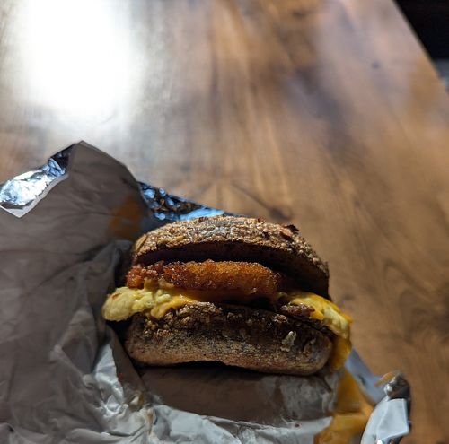 "The Burgh" Veganized. (hash brown, vegan cheese, vegan egg, vegan sausage on a bagel) at Brooklyn Bagel at Arsenal pittsburgh in Pittsburgh
