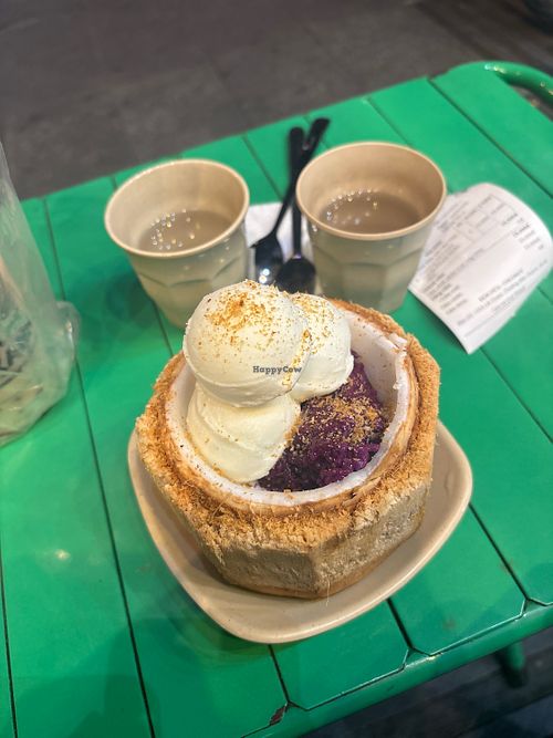 Coconut ice cream with sticky rice and free coconut water.    at Codonut in Ho Chi Minh City