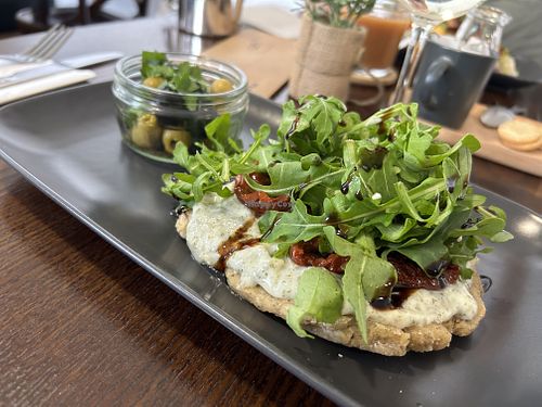 whipped feta, sun-dried tomatoes, rocket, balsamic, olives  at The Station Coffee + Kitchen in Stokesley