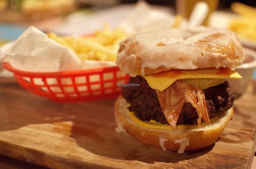 Luther burger ('beef' patty, maple candied facon, cheez and pineapple tucked into a house-made glazed donut) at Cornish Arms in Brunswick