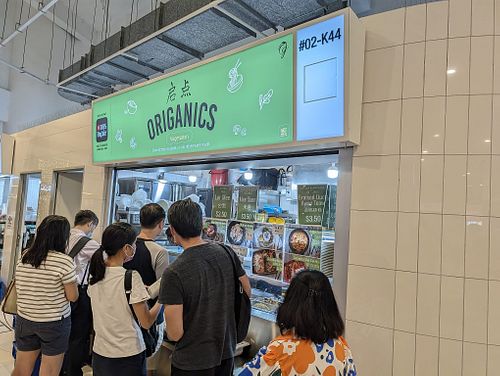 Long queue  at Origanics - 启点 - Sengkang Grand Mall in Northeast Singapore