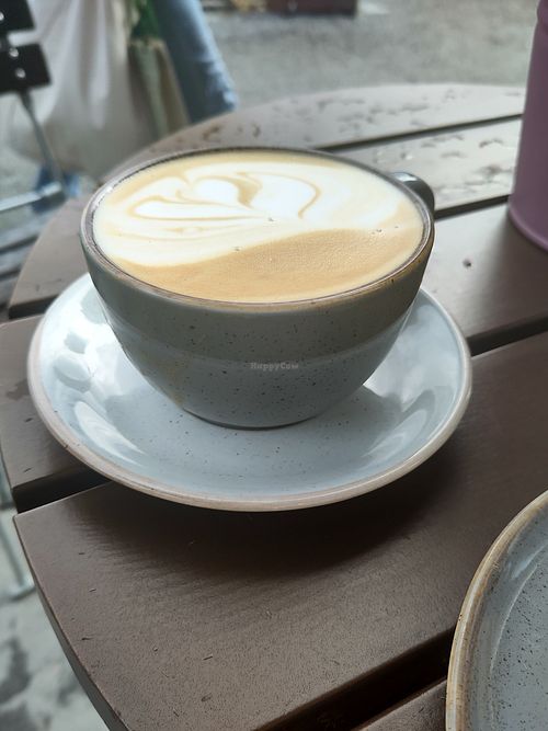 Latte with oat milk at Godt Brød - Festplassen in Bergen