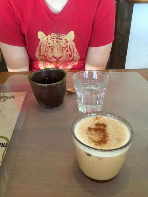 Coffee and iced chai with soy milk at Bon On Shya International Cafe in Koya