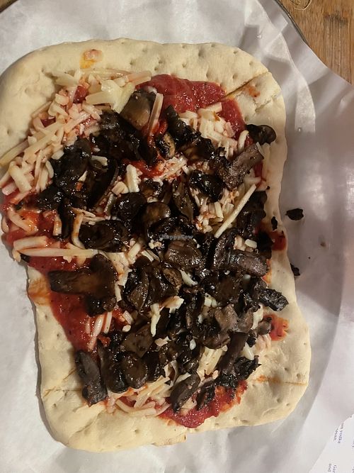Vegan flatbread option with marinara sauce, vegan cheese, and mushrooms  at Talarico's Pizzeria in Seattle