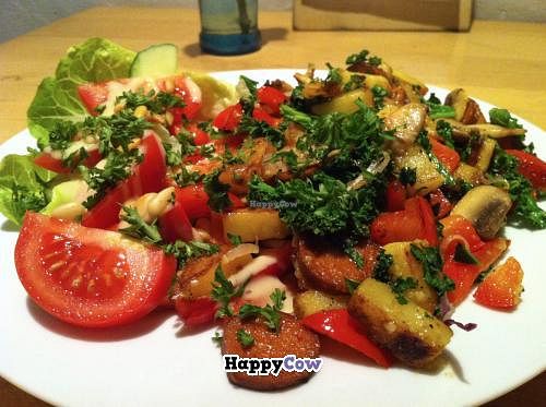 Wintery Pan Roast with potatos, Spanish vegan 'Chorizo', Grilled peppers, Champignons and Kale, served with a fresh salad of crispy lettuce, fresh tomatoes, pine nuts and pumpkin seeds! at Flax in Dresden