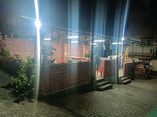 Seating area at Hotel Komal malkhed in Gorhe