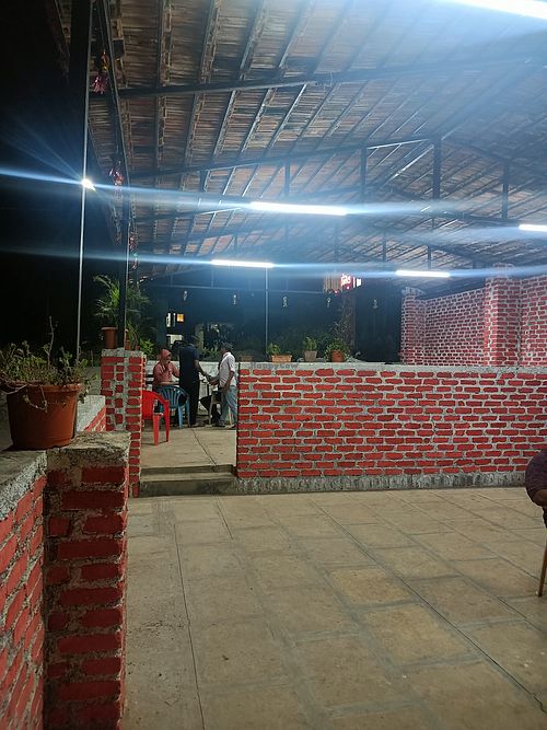 Seating area at Hotel Komal malkhed in Gorhe