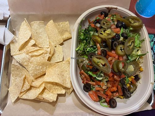 Vegan rice bowl. Tofu and variety of veggies and beans at Moe's Southwest Grill - SW Archer Rd in Gainesville