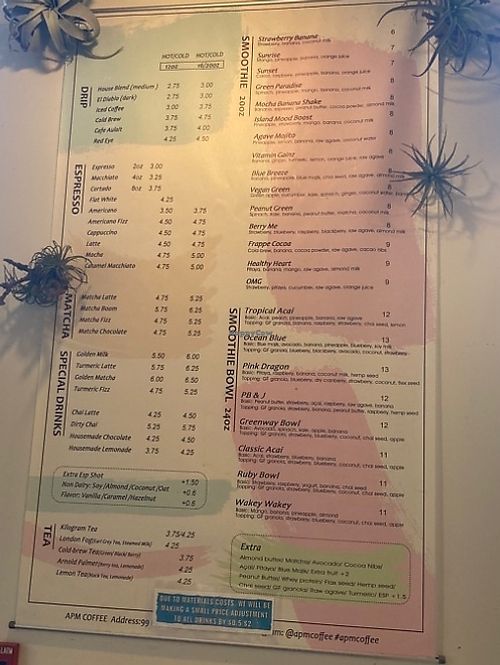 Wall menu for smoothies and ☕️   at APM Coffee in Boston