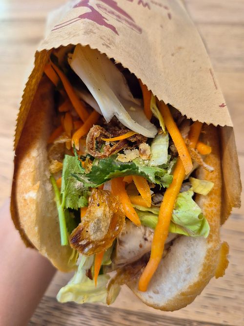 Tofu banh mi $10: delicious tofu and sauce, warm crusty bread, very generous filling! at I Wrap Cafe in Melbourne