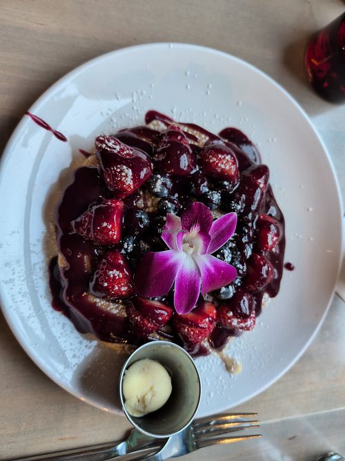 Berry blast vegan pancakes served with vegan butter. Just wonderful...not cloyingly sweet. It's so great to have a great breakfast option. at Sweet Diner in Milwaukee