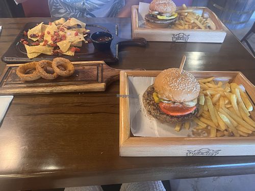 Plant based burger, onion rings, and nachos (with no sour cream and cheese)  at Wild West in Sharm El Sheikh