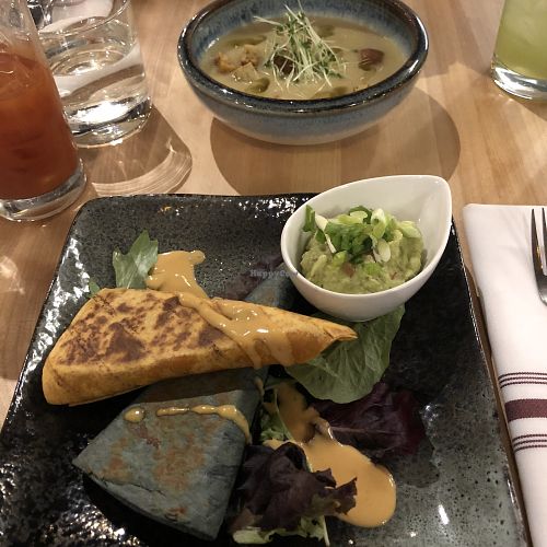 Quesadilla et saucisse avec sauce mexicaine et Soupe du jour au chou-fleur at Invitation V in Montreal