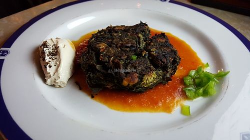 Spinach patty with vegan cream cheese at Zakaim - Vegan Boutique in Tel Aviv