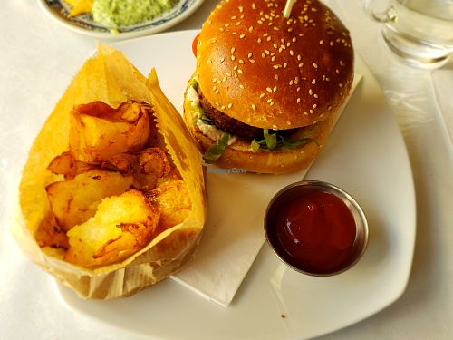 The impossible burger with smashed potato "chips" at Zakaim - Vegan Boutique in Tel Aviv