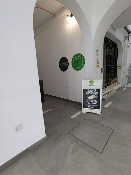 Turn left at SAM'S KITCHEN in 