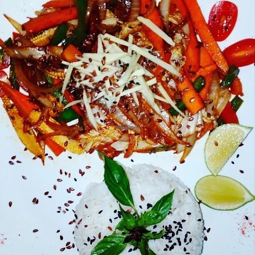 Fried vegetables in teriyaki sauce with fresh ginger, chia and flax seeds at Bamboo Bar & Vegetarian Restaurant in Sihanoukville