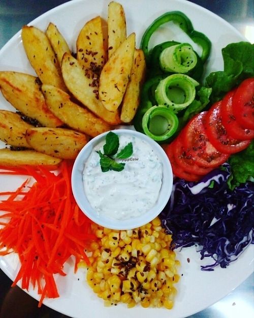 Village potato with corn, carrots, red cabbage and capsicum filled with chia seeds at Bamboo Bar & Vegetarian Restaurant in Sihanoukville